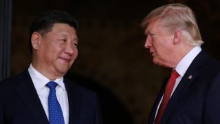 FILE PHOTO: U.S. President Donald Trump welcomes Chinese President Xi Jinping at Mar-a-Lago state in Palm Beach, Florida, U.S., April 6, 2017. REUTERS/Carlos Barria/File Photo TPX IMAGES OF THE DAY